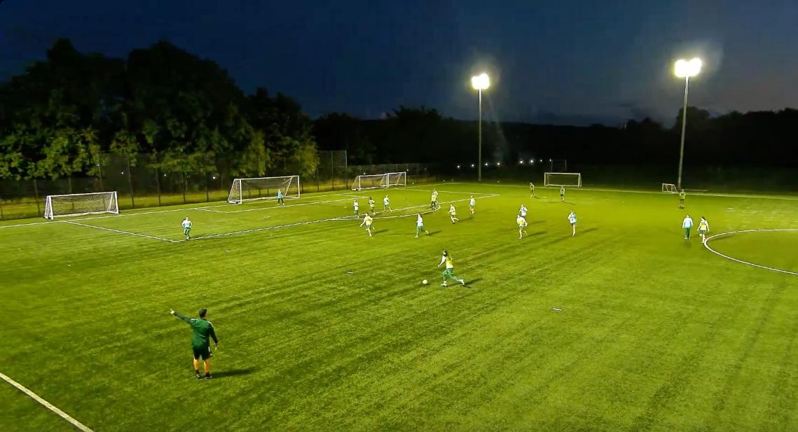 Jonathan directing a game on the 3G under the floodlights